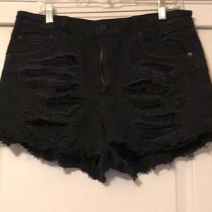Black ripped up high waisted shorts